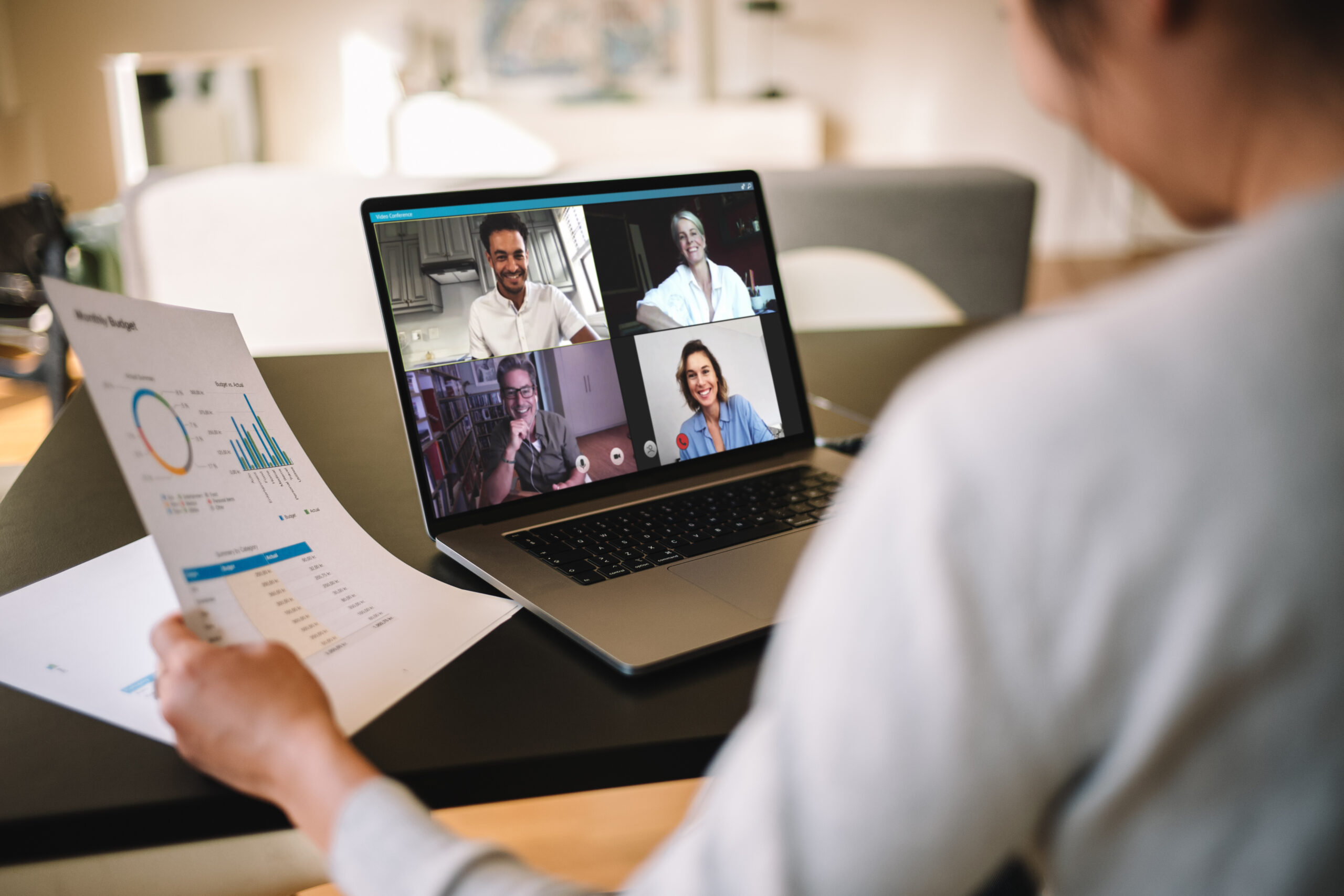 Businesswoman having online business meeting from home